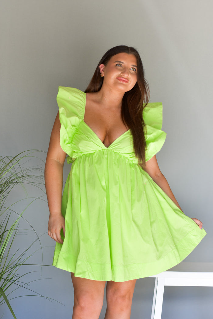 lime green babydoll style dress with flutter puff sleeves