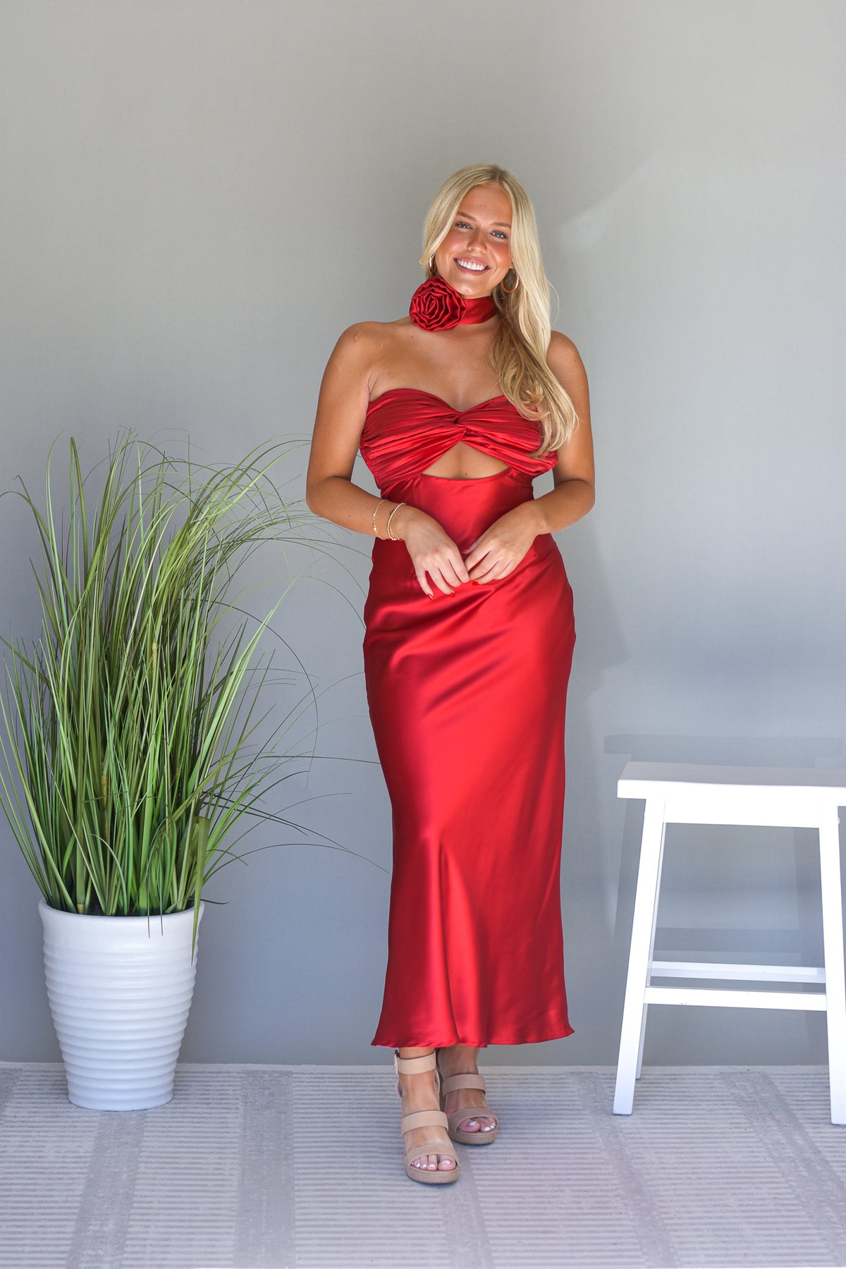 Red satin maxi dress with flower neck scarf 